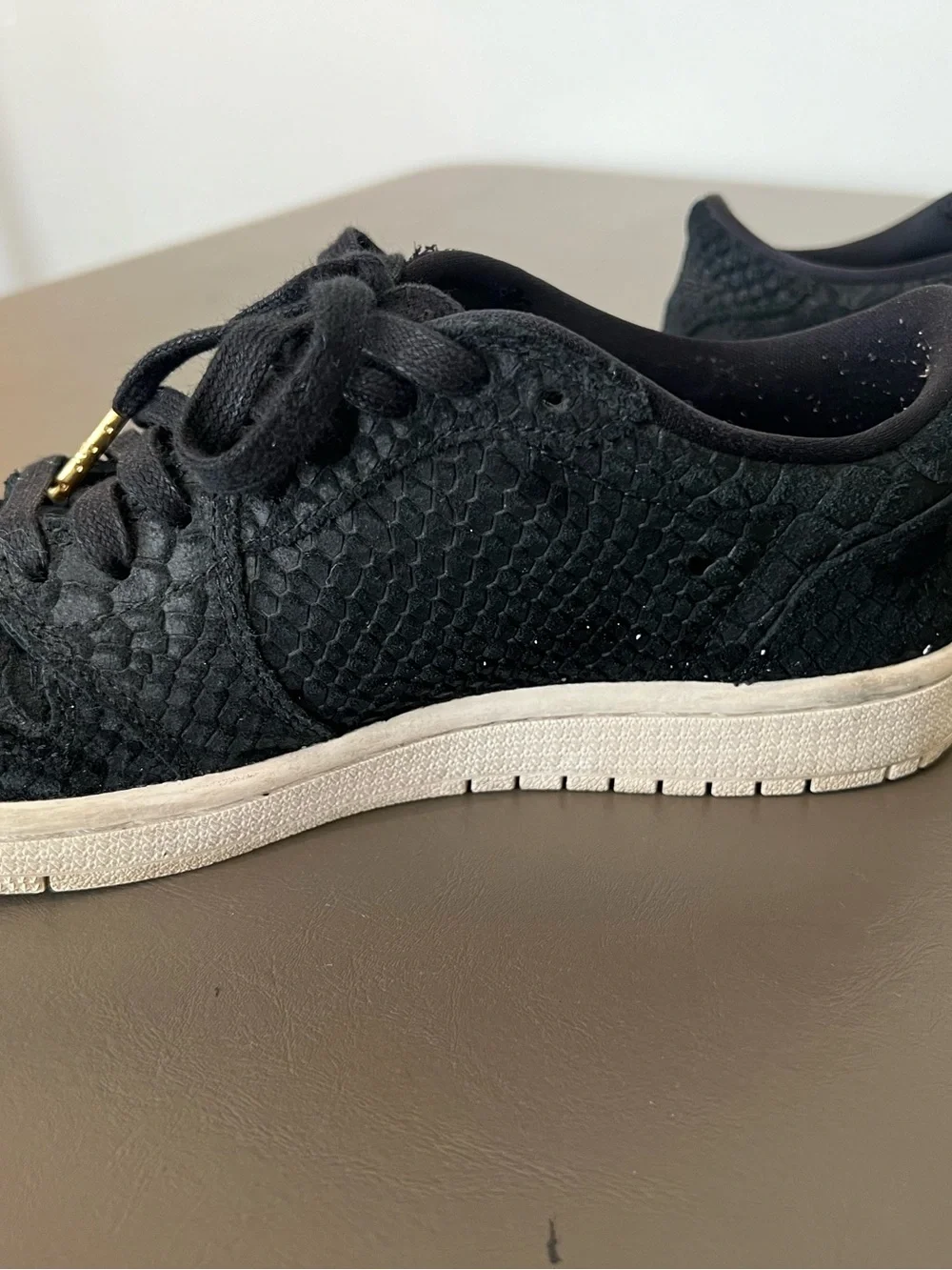 Jordan Women's Black Low-Top Sneakers with Gold Lace Aglets